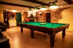 Entertaining will never be the same again. Enjoy playing pool, throwing darts, shuffleboard or what ever you have in mind.