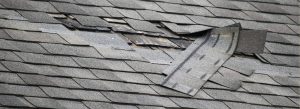 Damaged roof shingles will often lead to a leaky roof and significant damage.