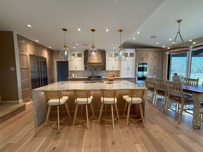 Luxury open-concept kitchen remodel with quartzite island and custom wood cabinetry in South Jersey