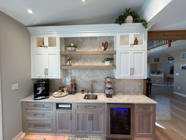 Custom coffee and beverage bar with floating shelves and quartzite backsplash by South Jersey contractor