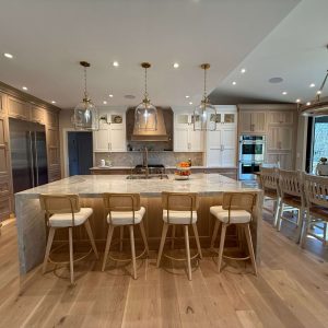 Luxury open-concept kitchen remodel with quartzite island and custom wood cabinetry in South Jersey