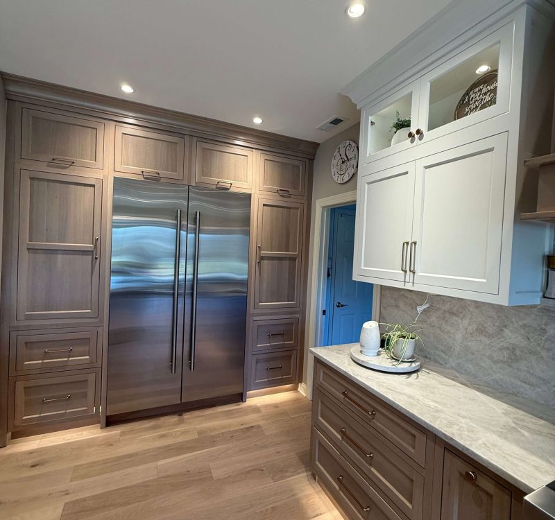 Custom kitchen with built-in stainless refrigerator and floor-to-ceiling cabinetry in South Jersey